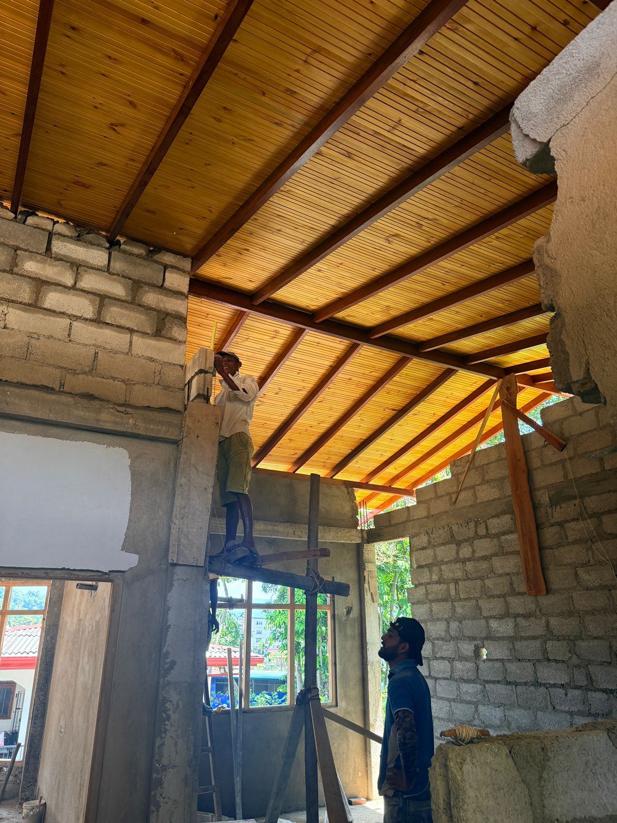 Timber roof framing being installed inside a new house